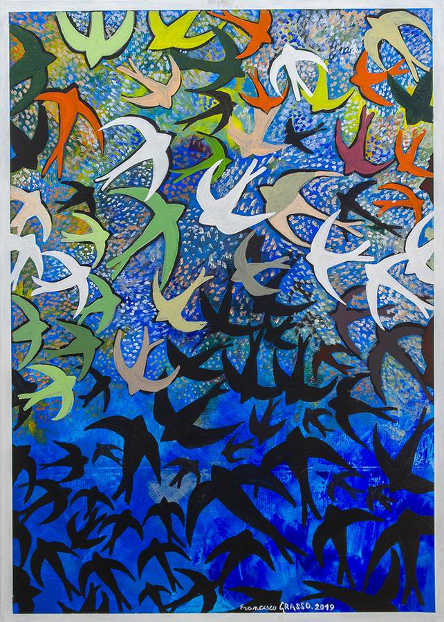 volo-di-rondini-blu-cielo