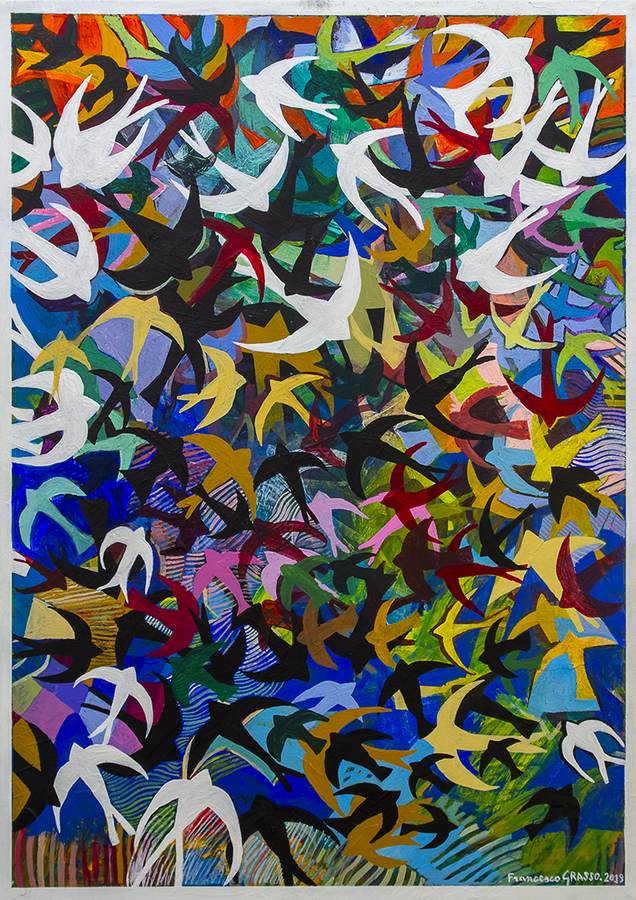 volo-di-rondini-azzurro-blu-cielo