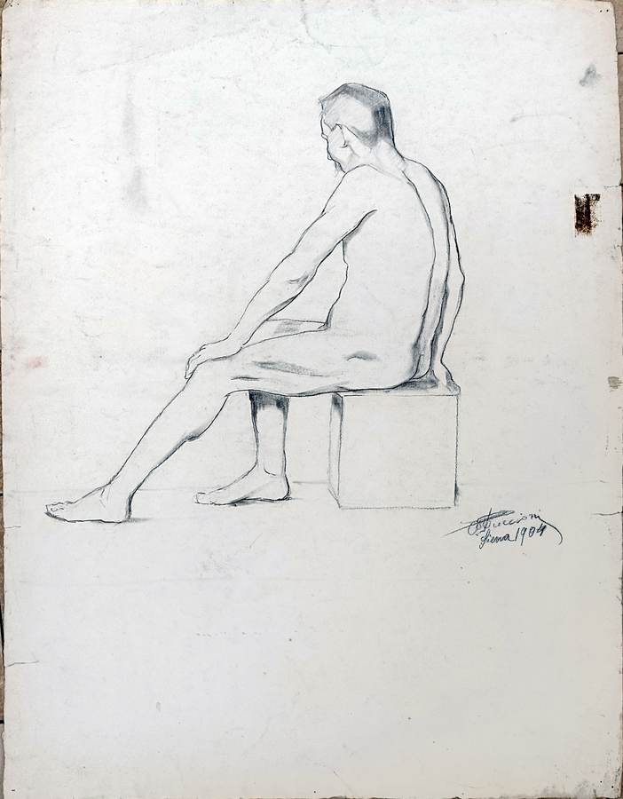 studio-nudo-maschile-seduto